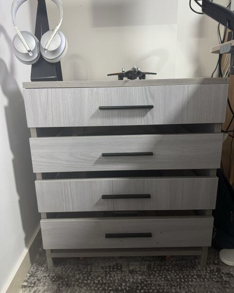 The finished four-drawer laptop rack in place